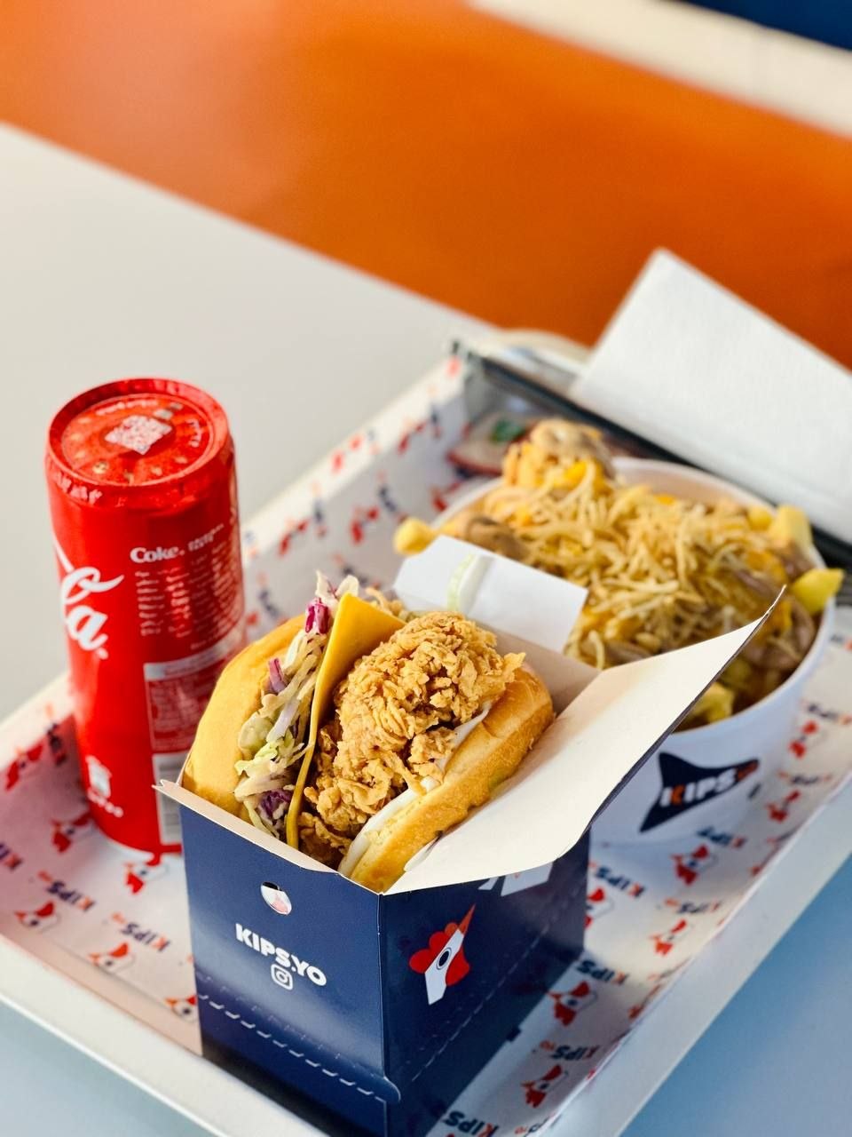 Crispy chicken sandwich box meal with loaded fries