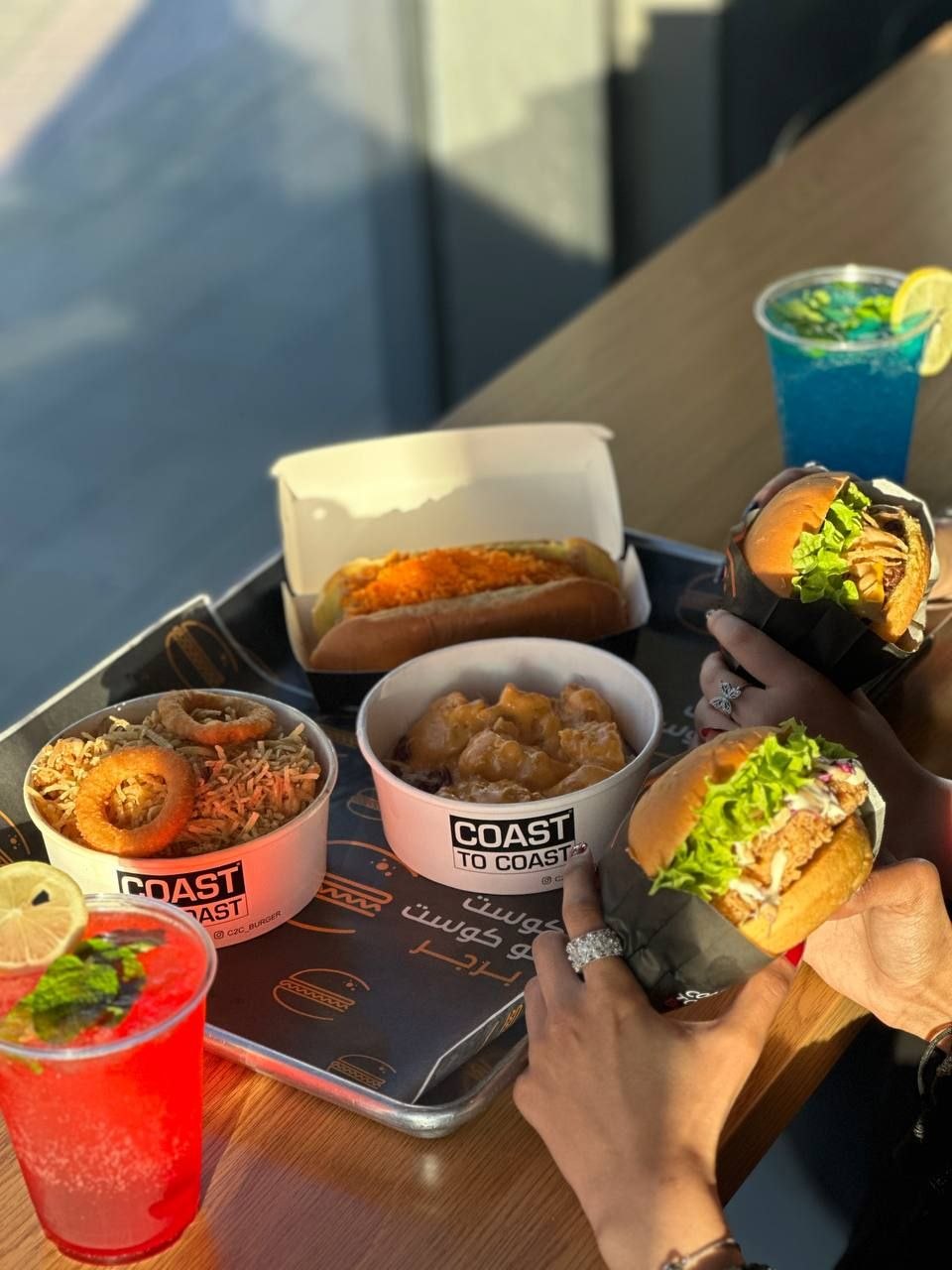 A shared table spread from the FTM Food and Beverages brands